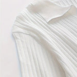 Detailweergave van de witte stof van Vitaknit MuscleFit trui